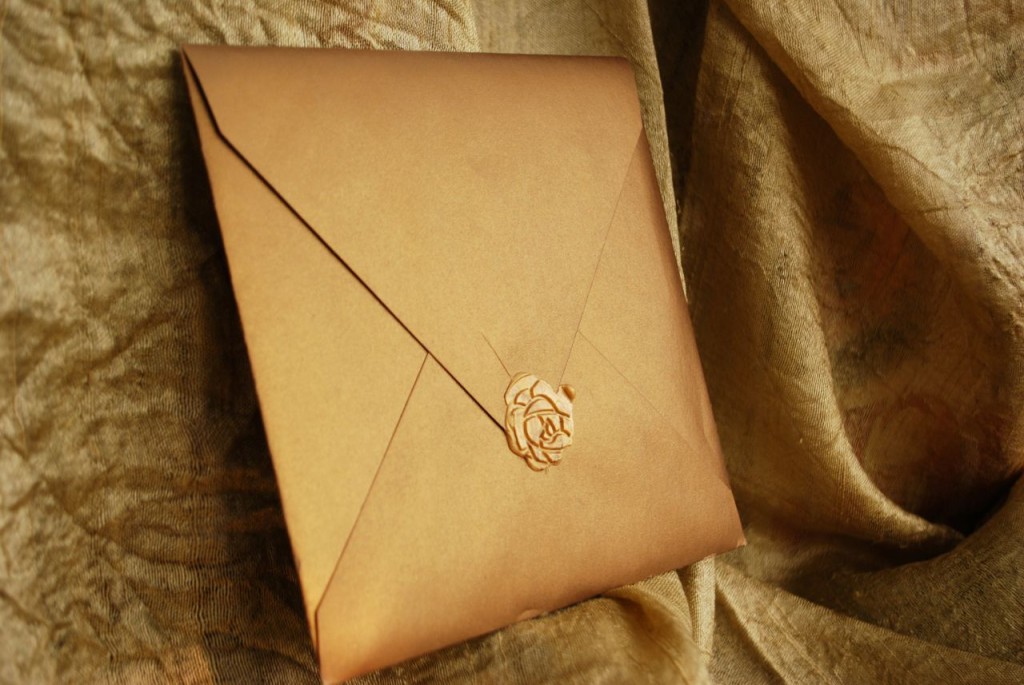 Gold wax seal on rust gold envelope (I am out of these envelopes)