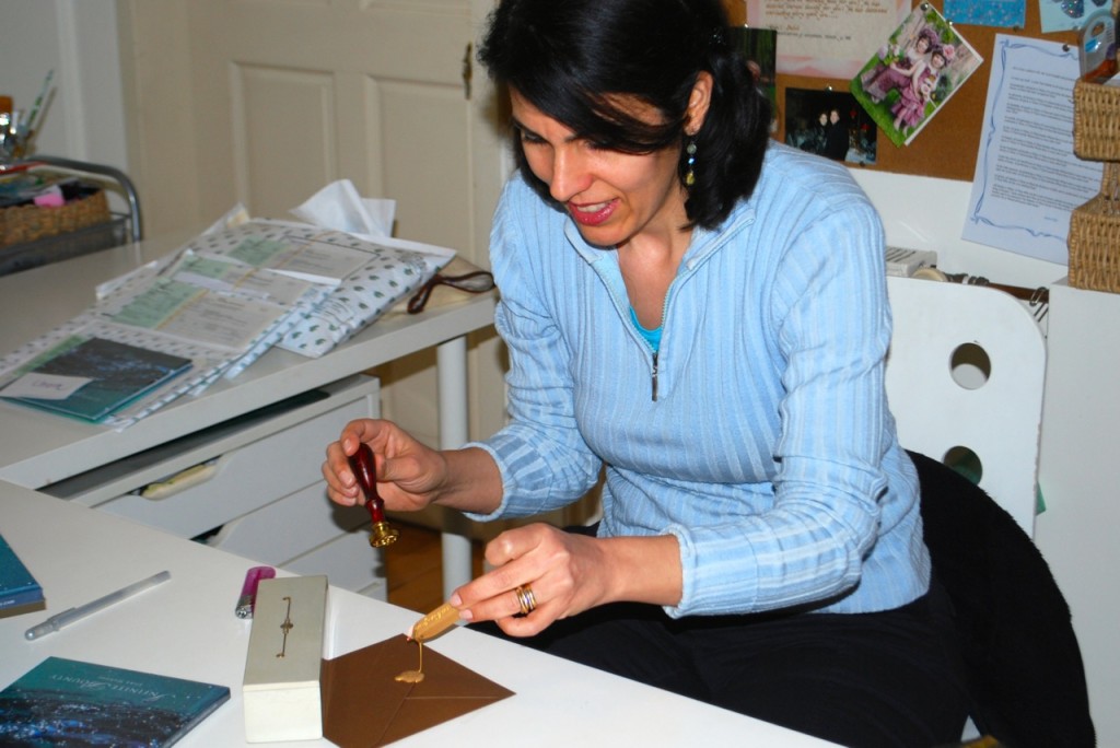 Adding wax seal to the envelopes for 'Infinite Bounty Deluxe package' orders